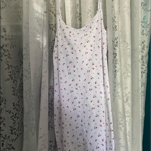 White body-con midi dress with red roses